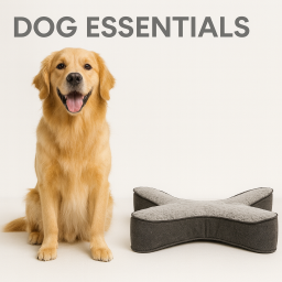 Dog sitting beside a modern orthopedic dog bed, representing essential dog products.
